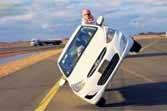 Changing Tires While Driving on Two Wheels