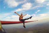 Riding The Wing Of A Glider Airplane