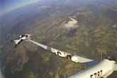 Wingsuit Flyer vs. Airplane